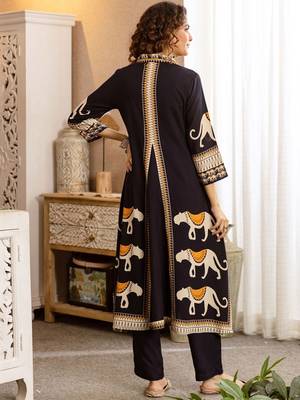 Women Ethnic Motifs Printed Panelled Kurta With Trousers 5