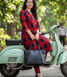 Women Printed Regular Kurta with Trousers