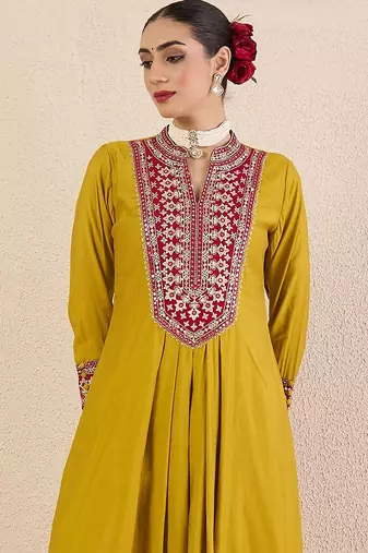Women Solid Embroidered Kurta with Pyjama