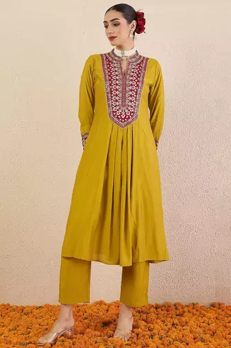 Women Solid Embroidered Kurta with Pyjama