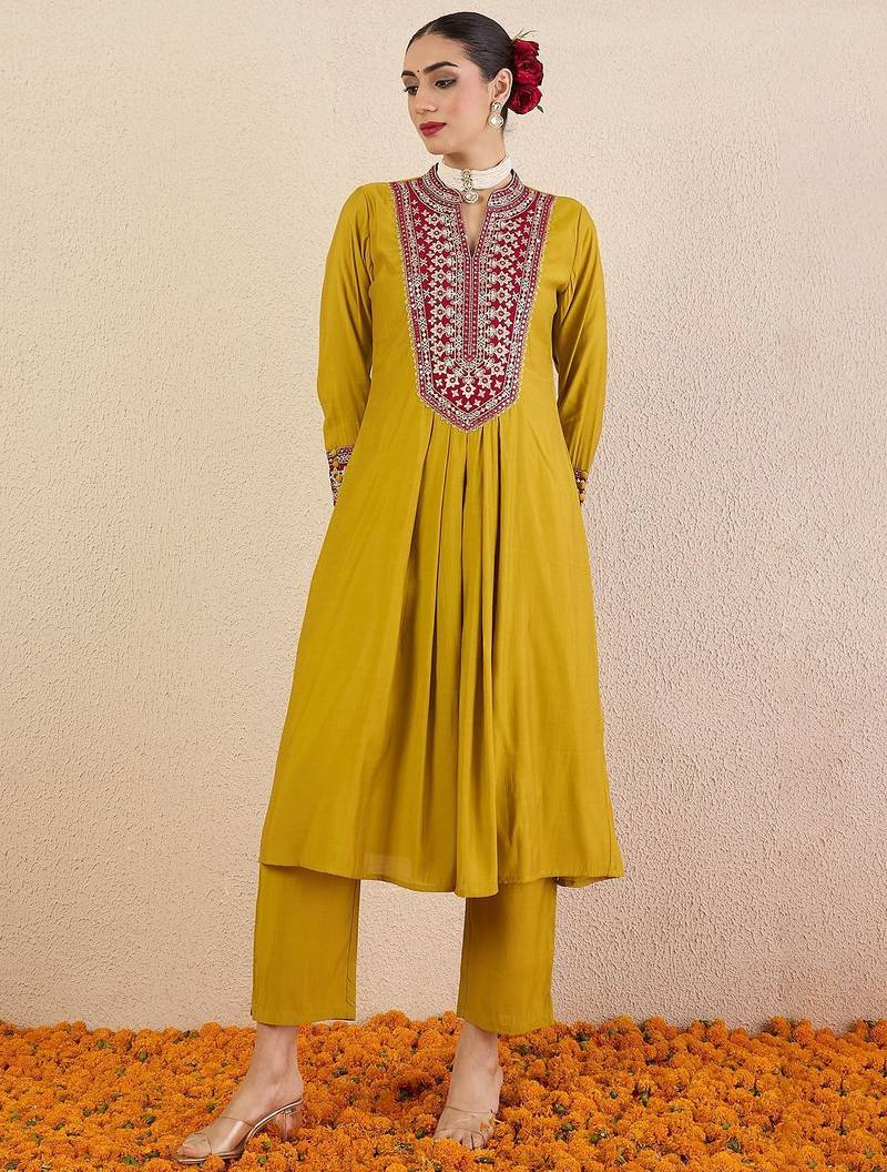 Women Solid Embroidered Kurta with Pyjama