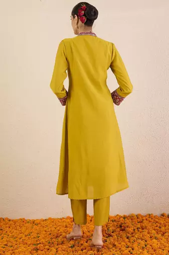 Women Solid Embroidered Kurta with Pyjama