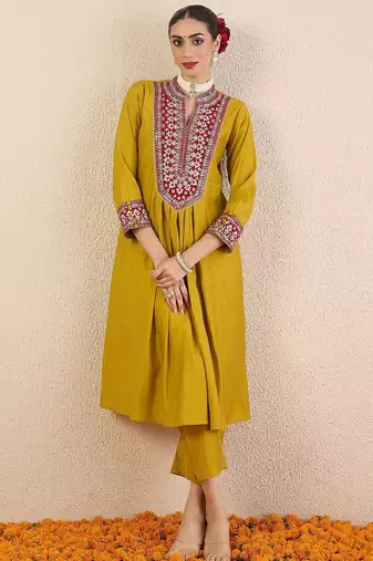 Women Solid Embroidered Kurta with Pyjama