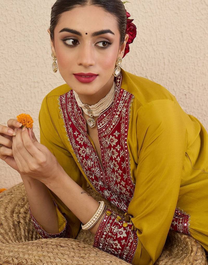 Women Solid Embroidered Kurta with Pyjama