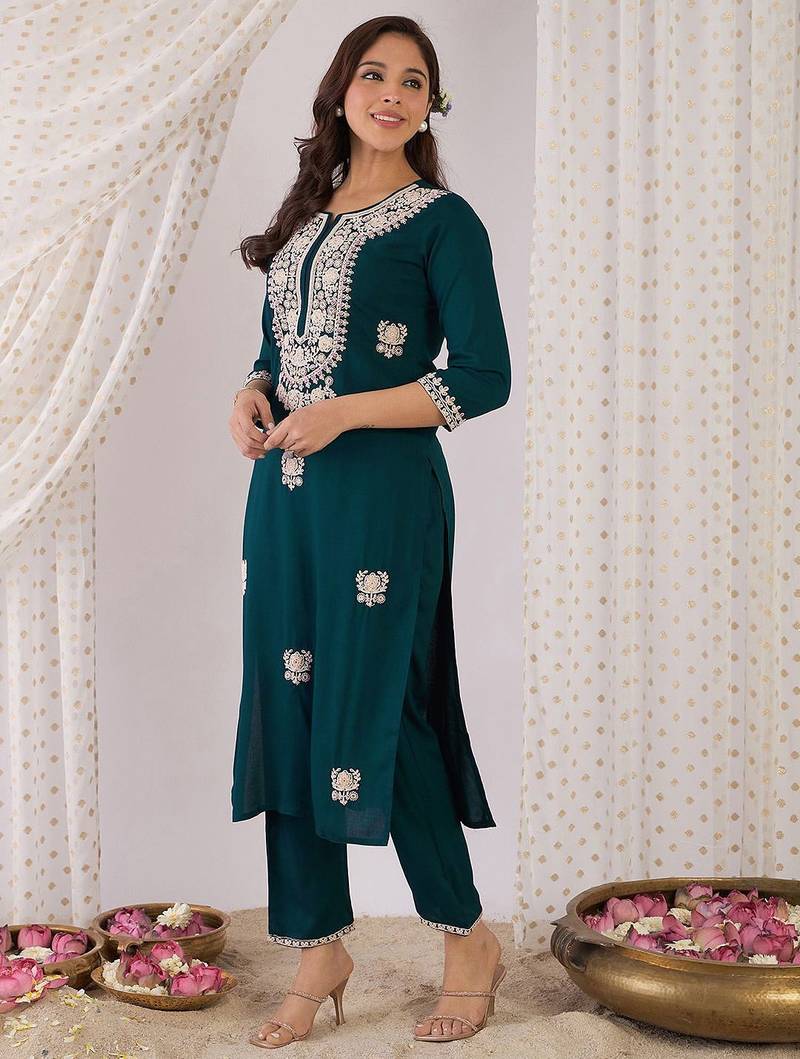Women Embroidered Regular Kurta with Trousers