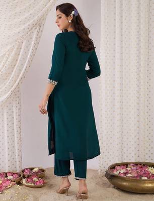 Women Embroidered Regular Kurta with Trousers 5