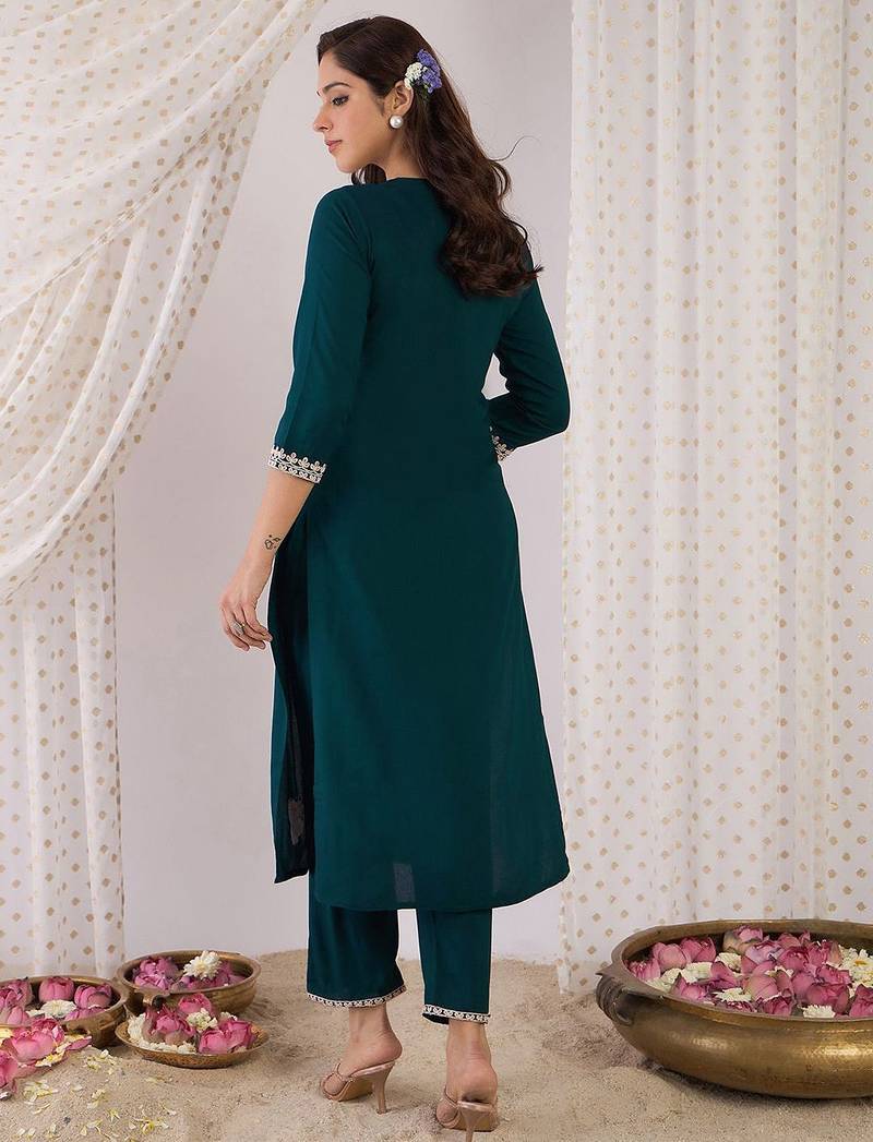 Women Embroidered Regular Kurta with Trousers