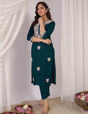 Women Embroidered Regular Kurta with Trousers 6