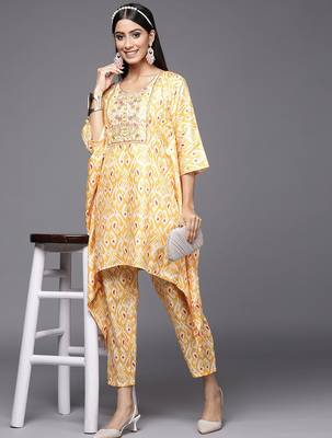 Women Yellow Ethnic Motifs Printed Sequinned Kurta with Trousers 1