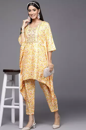 Women Yellow Ethnic Motifs Printed Sequinned Kurta with Trousers