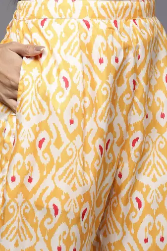 Women Yellow Ethnic Motifs Printed Sequinned Kurta with Trousers