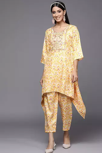 Women Yellow Ethnic Motifs Printed Sequinned Kurta with Trousers