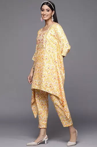 Women Yellow Ethnic Motifs Printed Sequinned Kurta with Trousers