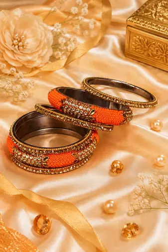 Stone embellished orange seed bead bangles