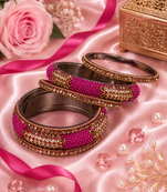 Stone embellished rani pink seed bead bangles