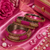 Stone embellished rani pink seed bead bangles