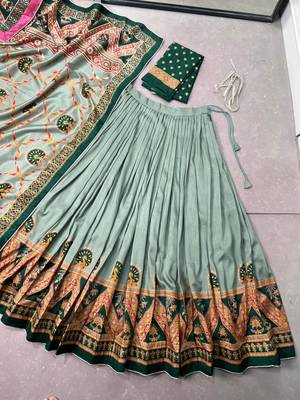 green traditional printed tussar  silk pleated lehenga choli 6