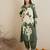 Green Floral Printed Sequinned V-Neck Straight Kurta With Salwar