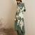 Green Floral Printed Sequinned V-Neck Straight Kurta With Salwar