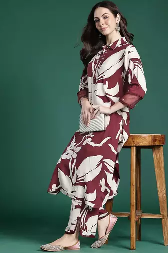 Women Floral Printed Sequinned Kurta with Trousers