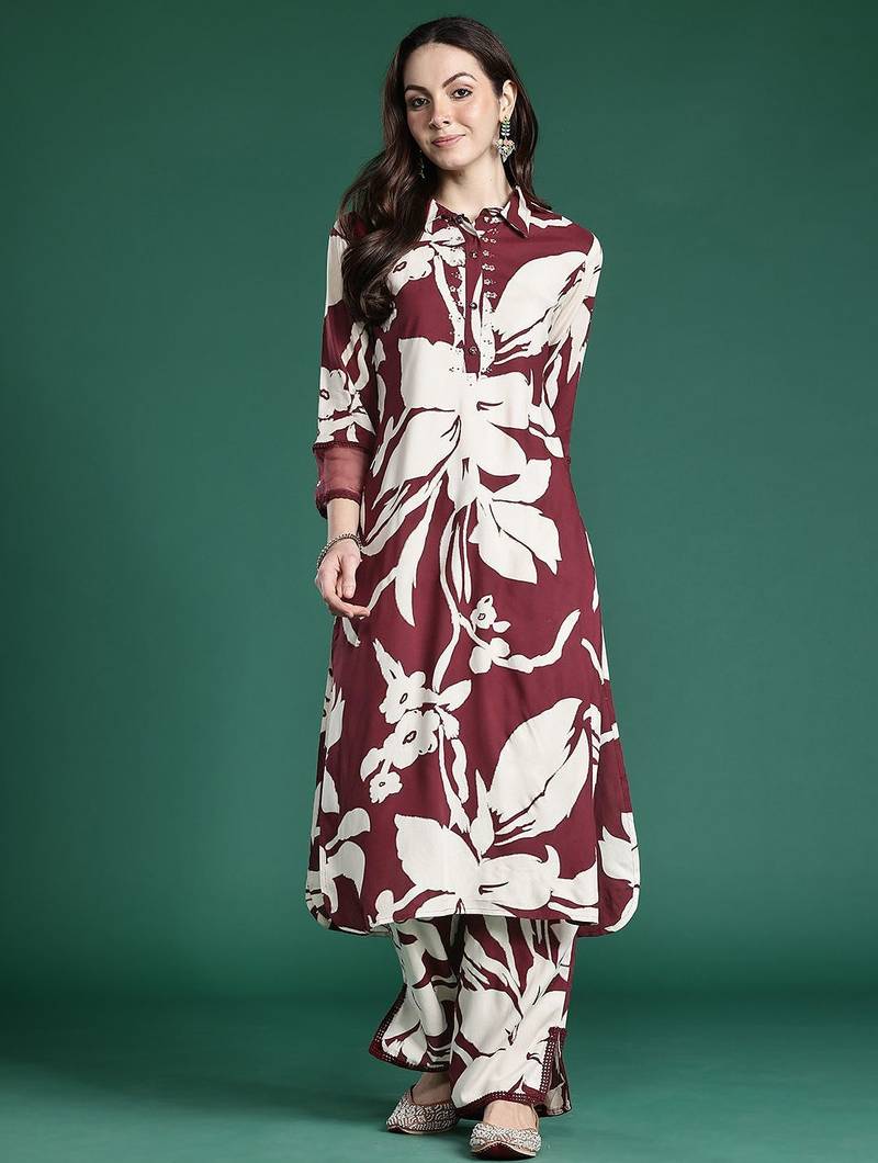 Women Floral Printed Sequinned Kurta with Trousers
