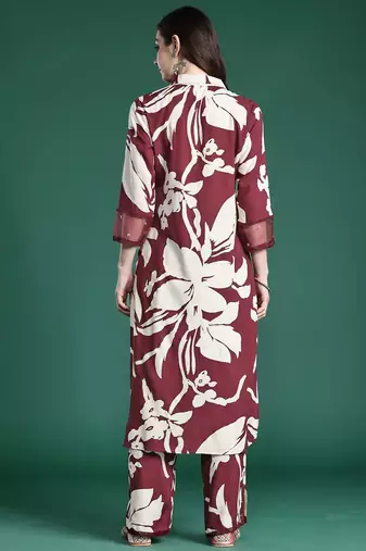 Women Floral Printed Sequinned Kurta with Trousers