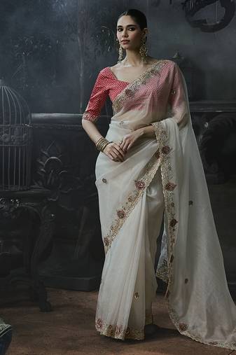Off-white tissue silk blend embroidered saree with pink blouse