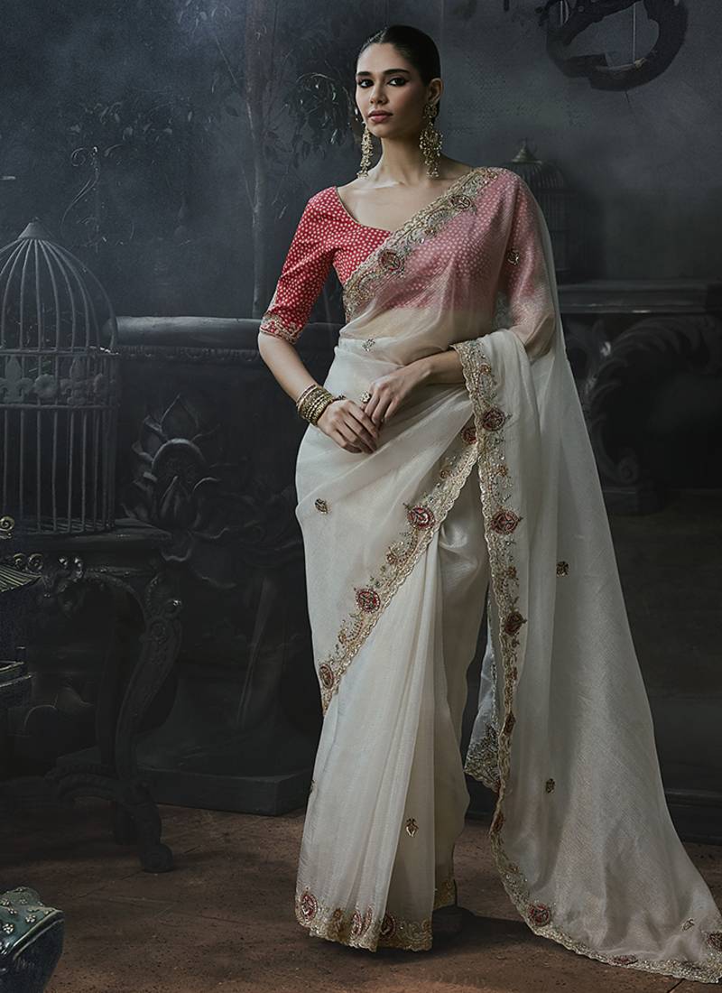 Off-white tissue silk blend embroidered saree with pink blouse
