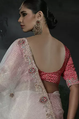 Off-white tissue silk blend embroidered saree with pink blouse