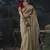 Beige tissue silk blend embroidered saree with red blouse