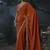 Orange tissue silk blend embroidered saree with blouse