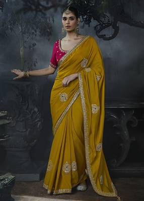 Mustard yellow tissue silk blend embroidered saree with rani pink blouse 1