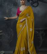 Mustard yellow tissue silk blend embroidered saree with rani pink blouse