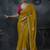 Mustard yellow tissue silk blend embroidered saree with rani pink blouse