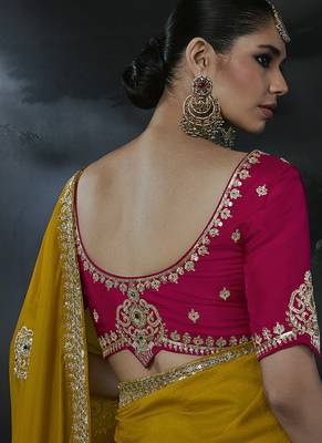 Mustard yellow tissue silk blend embroidered saree with rani pink blouse 2