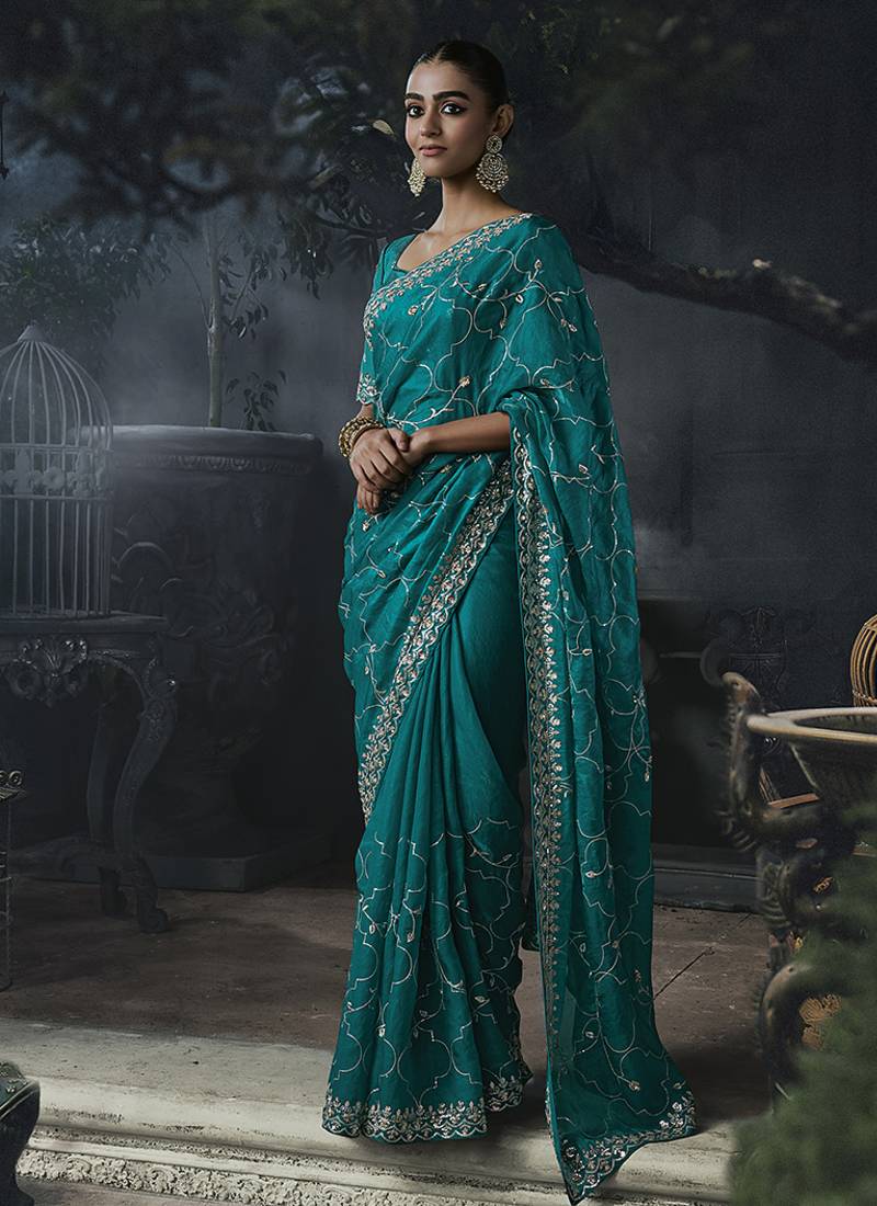 Teal blue tissue silk blend embroidered saree with blouse