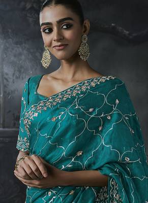 Teal blue tissue silk blend embroidered saree with blouse 4