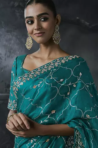 Teal blue tissue silk blend embroidered saree with blouse