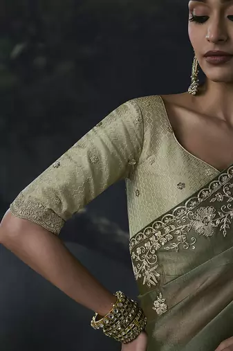 Olive green tissue silk blend embroidered saree with light olive green blouse