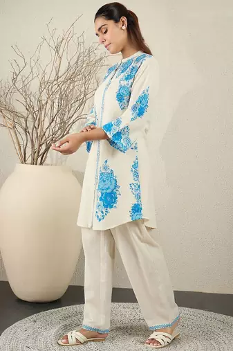 Women Floral Printed Cotton Kurta with Trousers