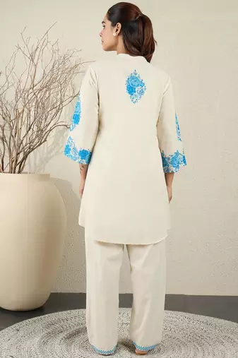 Women Floral Printed Cotton Kurta with Trousers