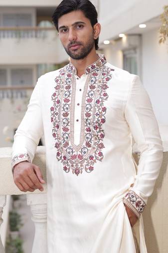Ivory embroidered festive kurta with placket and hem detailing for men