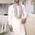 Ivory embroidered festive kurta with placket and hem detailing for men