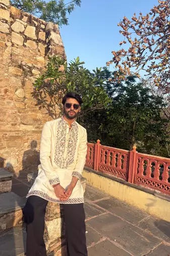 Cream kurta with multi colour stone work yoke embroidery for men