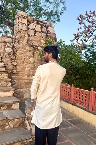 Cream kurta with multi colour stone work yoke embroidery for men