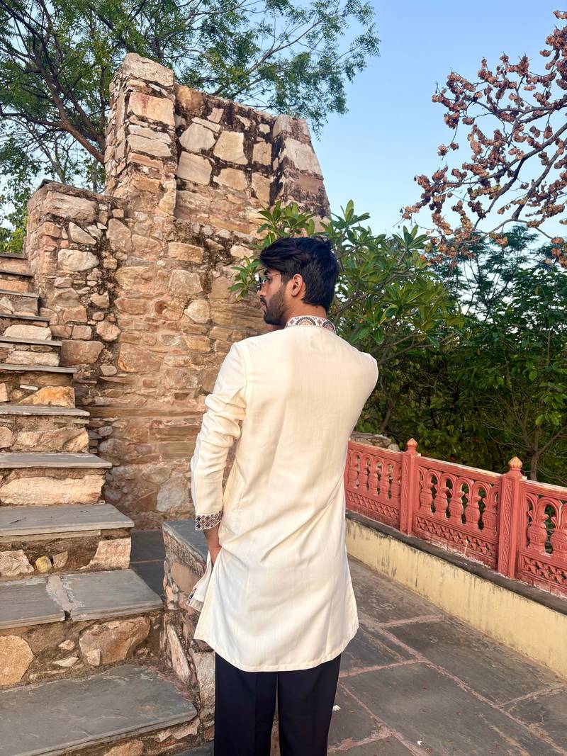 Cream kurta with multi colour stone work yoke embroidery for men