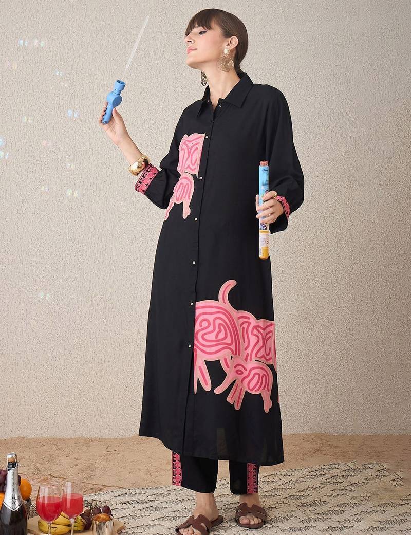 Women Ethnic Motifs Printed Regular Thread Work Kurta with Trousers