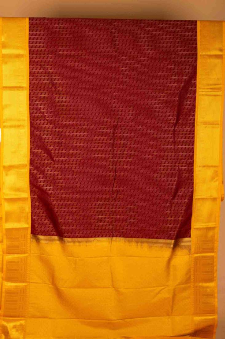 Maroon and yellow semi silk saree with blouse