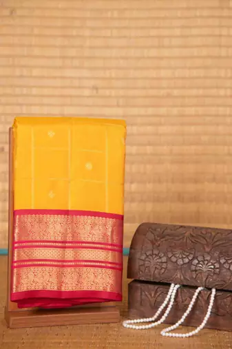 Yellow and pink zari checked silk saree with blouse