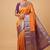 Orange and purple brocade silk saree with blouse